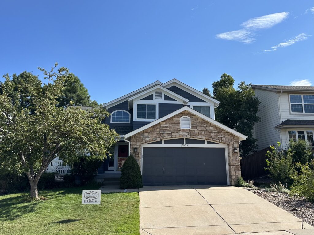 Freshly painted gutters and fascia on a Golden Colorado home